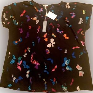 Elegant navy blue blouse with colourful butterflies